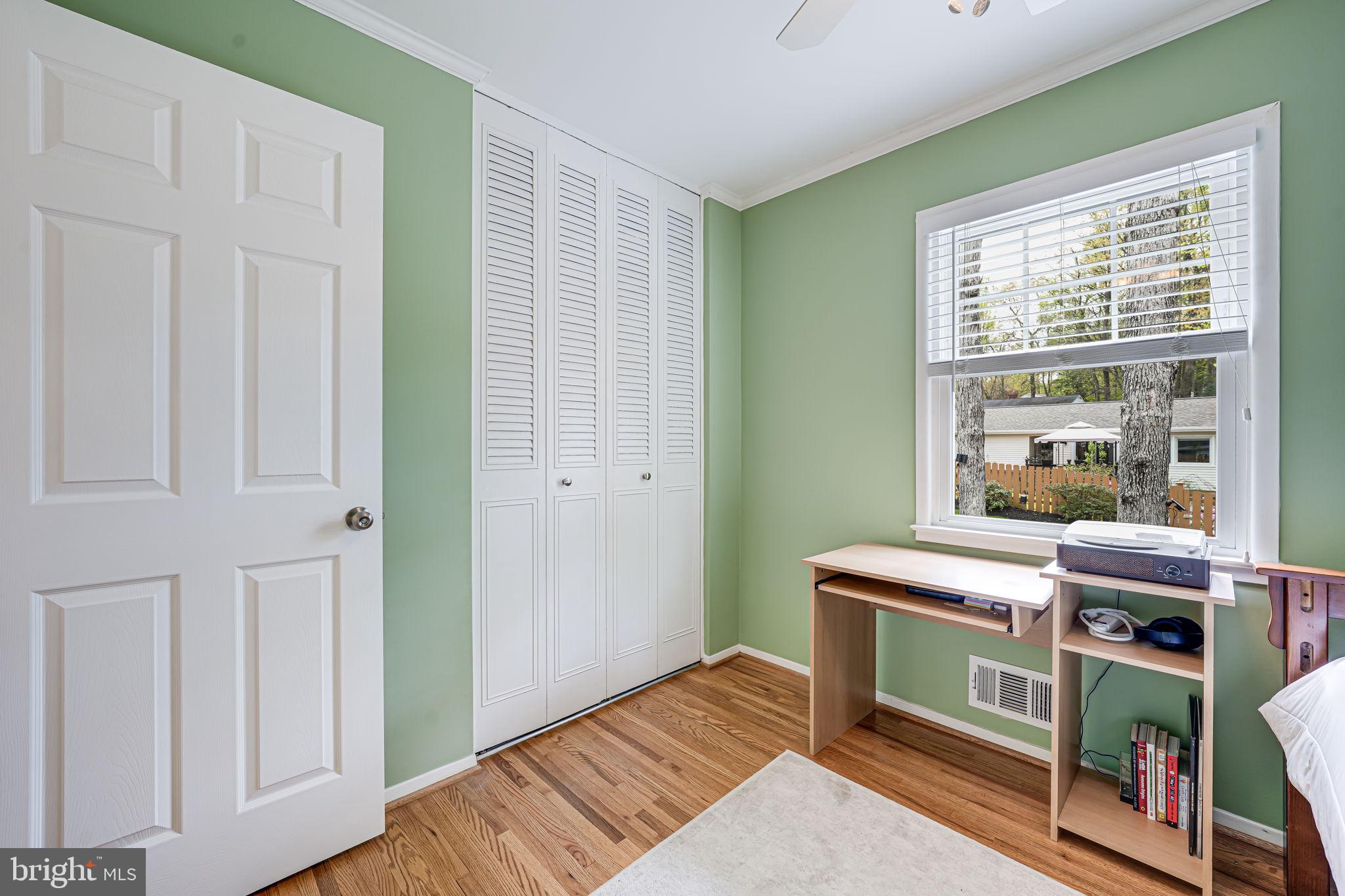 8315 Greeley Boulevard Springfield, VA 22152 - Photo 20 of 44 a room with a bed and a window