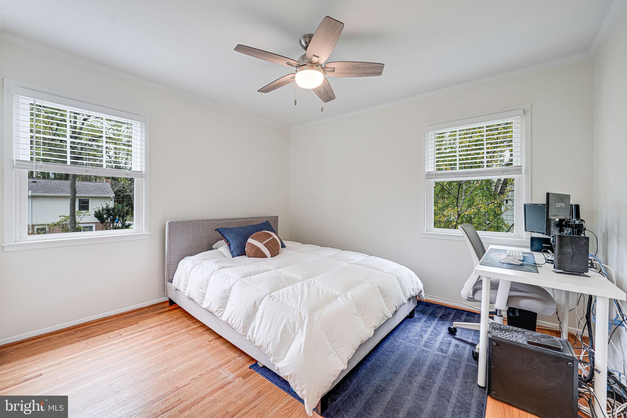 8315 Greeley Boulevard Springfield, VA 22152 - Photo 22 of 44 a bedroom with a bed and a window