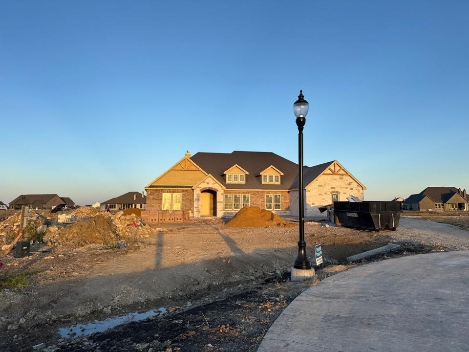 2212 Continent Court Krum, TX 76249 - Photo 1 of 15 a front view of a house with a yard