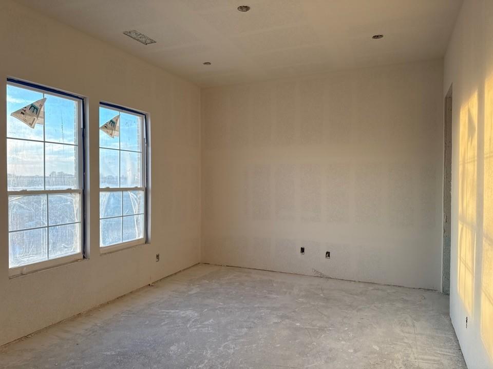 2212 Continent Court Krum, TX 76249 - Photo 6 of 15 an empty room with a window