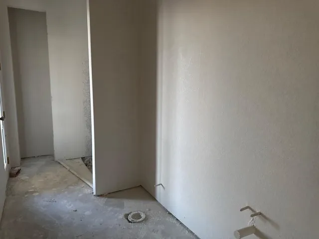 an empty room with closet