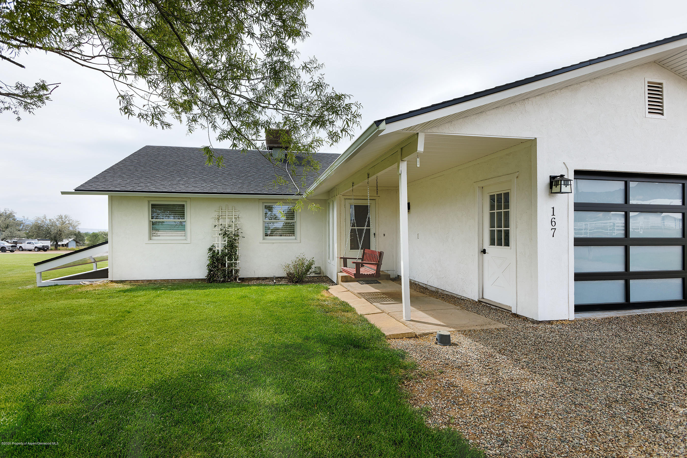 167 Fox Run Road Rifle, CO 81650 - Photo 3 of 36 front view of a house with a yard