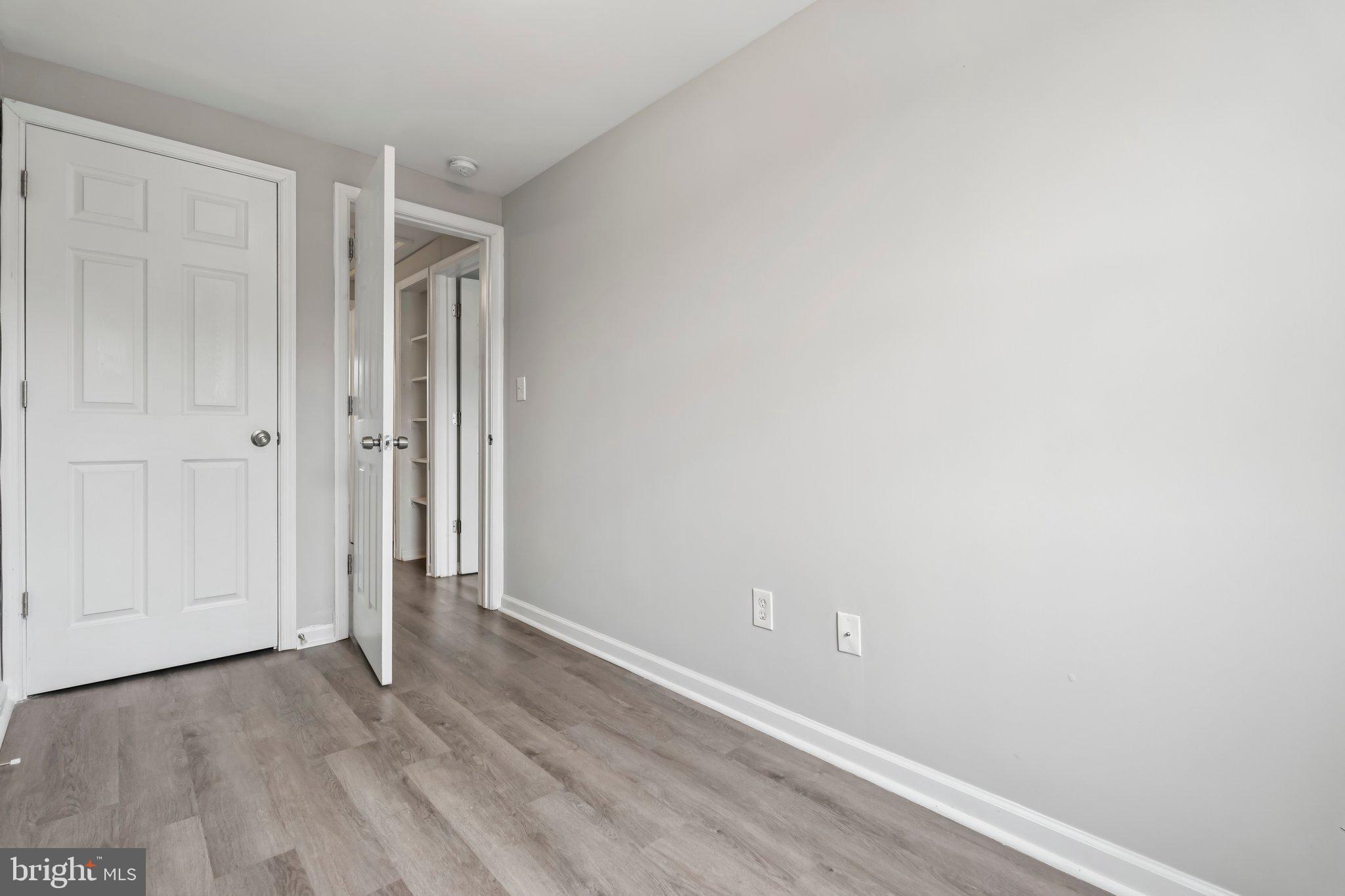 7838 St Boniface Lane Dundalk, MD 21222 - Photo 18 of 37 a view of an empty room