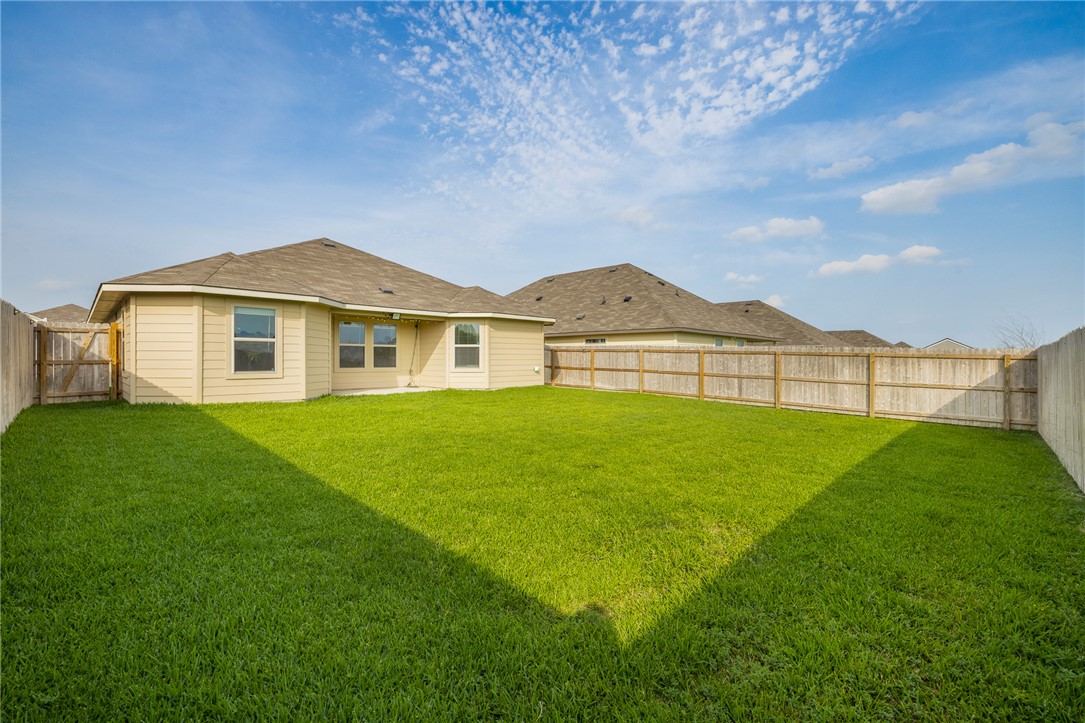 2110 Chief Street Bryan, TX 77807 - Photo 14 of 16 Back of house featuring a fenced backyard