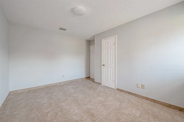 an empty room with an entryway