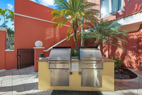 a table and chairs in front of building