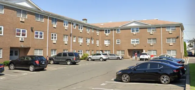 a car parked in front of a building