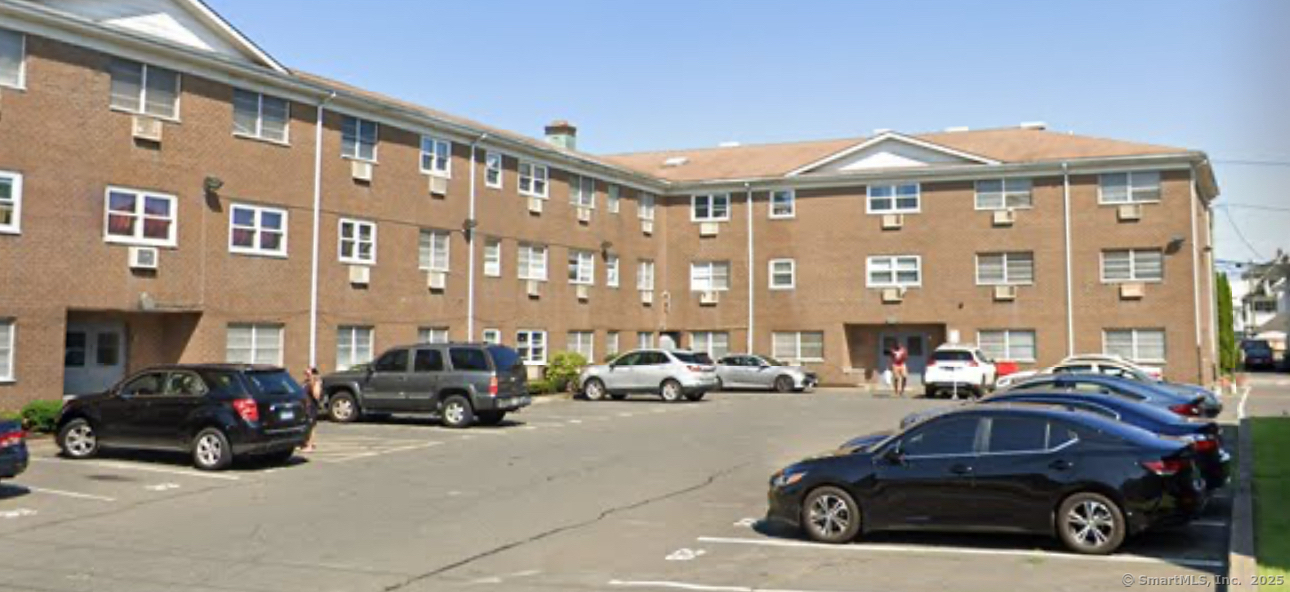a car parked in front of a building