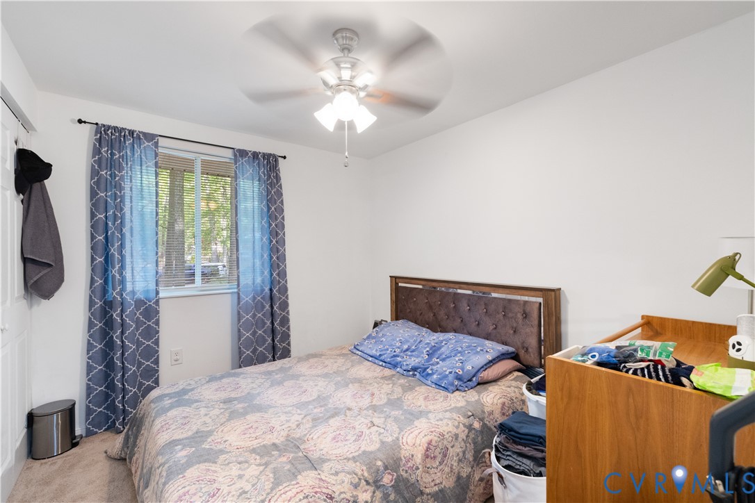 13313 Farm Crest Court Midlothian, VA 23112 - Photo 12 of 24 a bedroom with a bed and a window