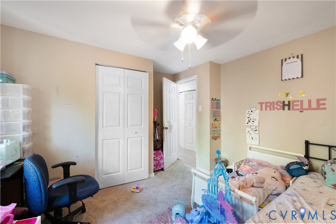 13313 Farm Crest Court Midlothian, VA 23112 - Photo 14 of 24 a bedroom with a bed and furniture