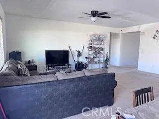 a view of kitchen with sink and dining area