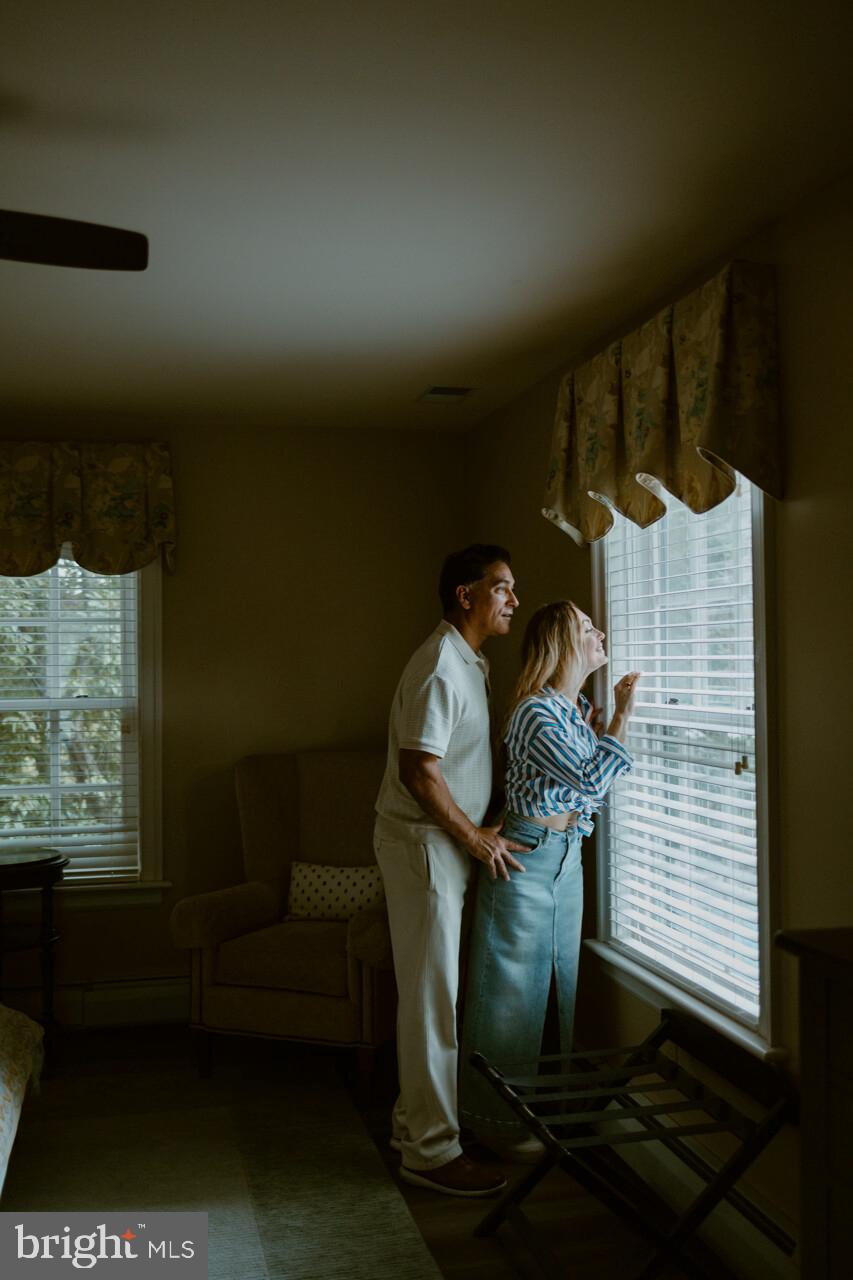 5024 Leeds Manor Road Hume, VA 22639 - Photo 27 of 57 Couple looking out Bird Room