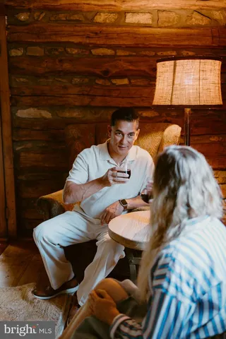 a aerial view of a house with swimming pool and patio