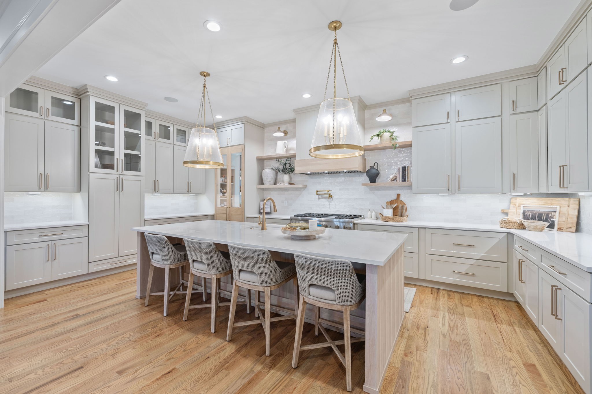 2904 Snowden Road Nashville, TN 37204 - Photo 21 of 69 a kitchen with stainless steel appliances kitchen island granite countertop a table chairs sink and cabinets