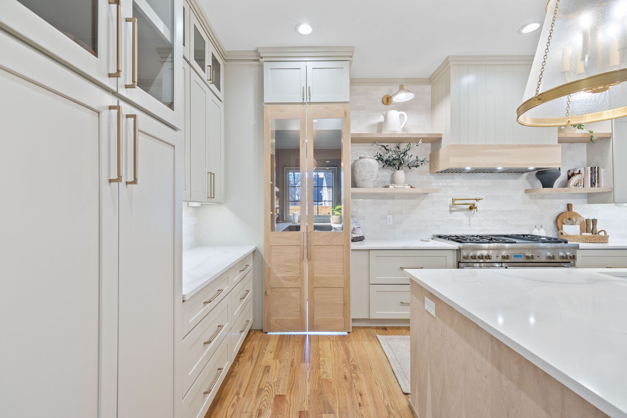 2904 Snowden Road Nashville, TN 37204 - Photo 24 of 69 a kitchen with stainless steel appliances granite countertop a sink stove and refrigerator