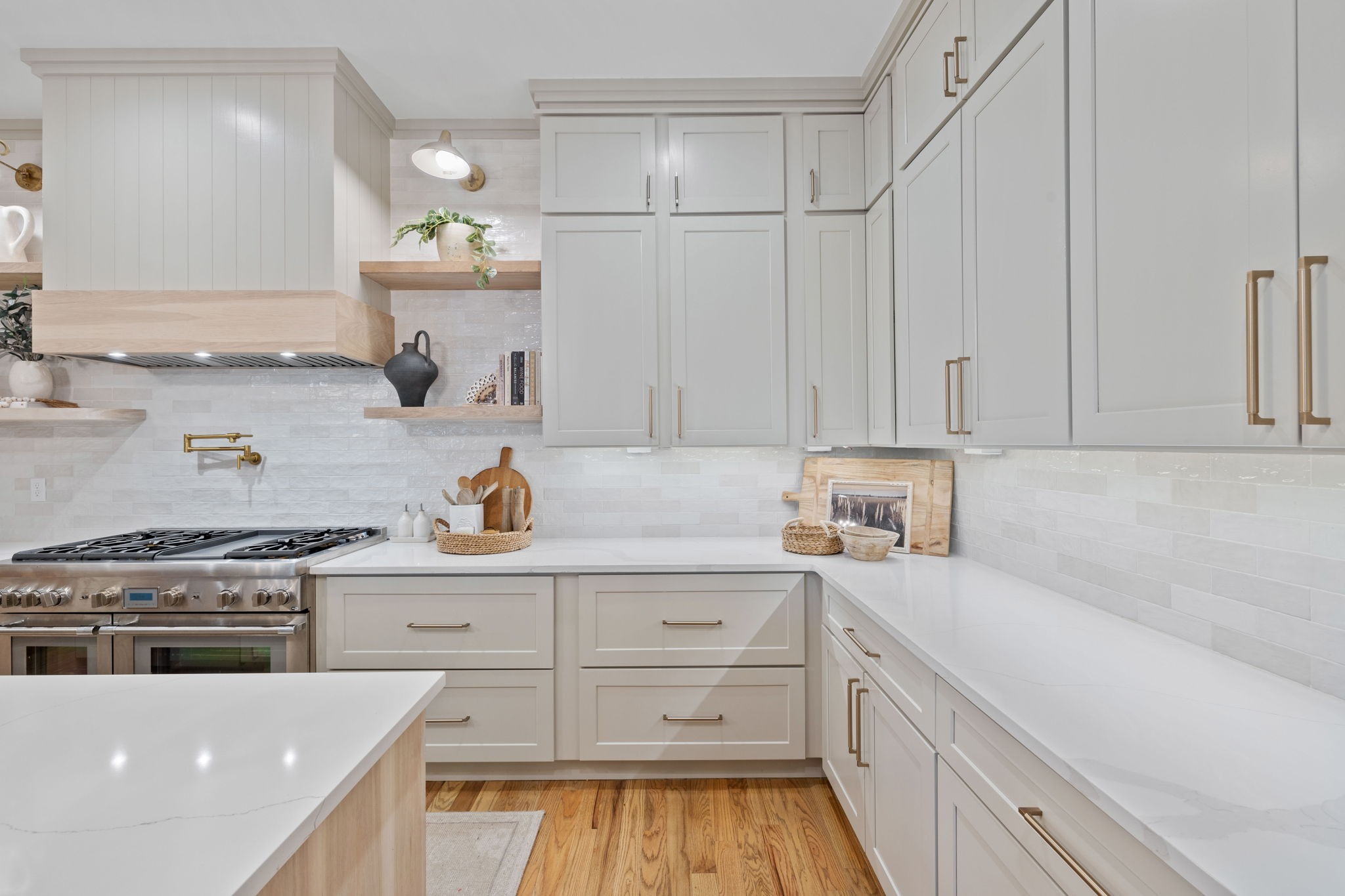 2904 Snowden Road Nashville, TN 37204 - Photo 30 of 69 a kitchen with granite countertop white cabinets and white appliances