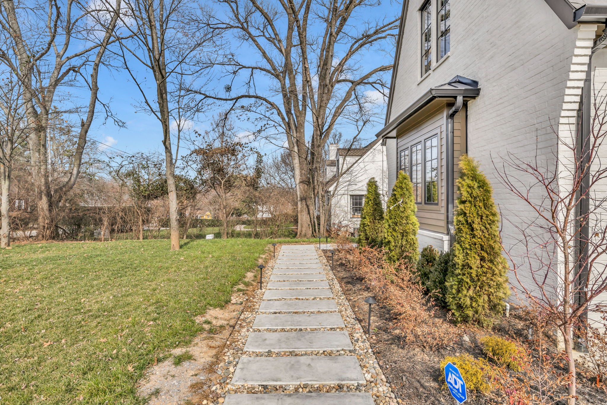 2904 Snowden Road Nashville, TN 37204 - Photo 5 of 69 a pathway of a house with a yard