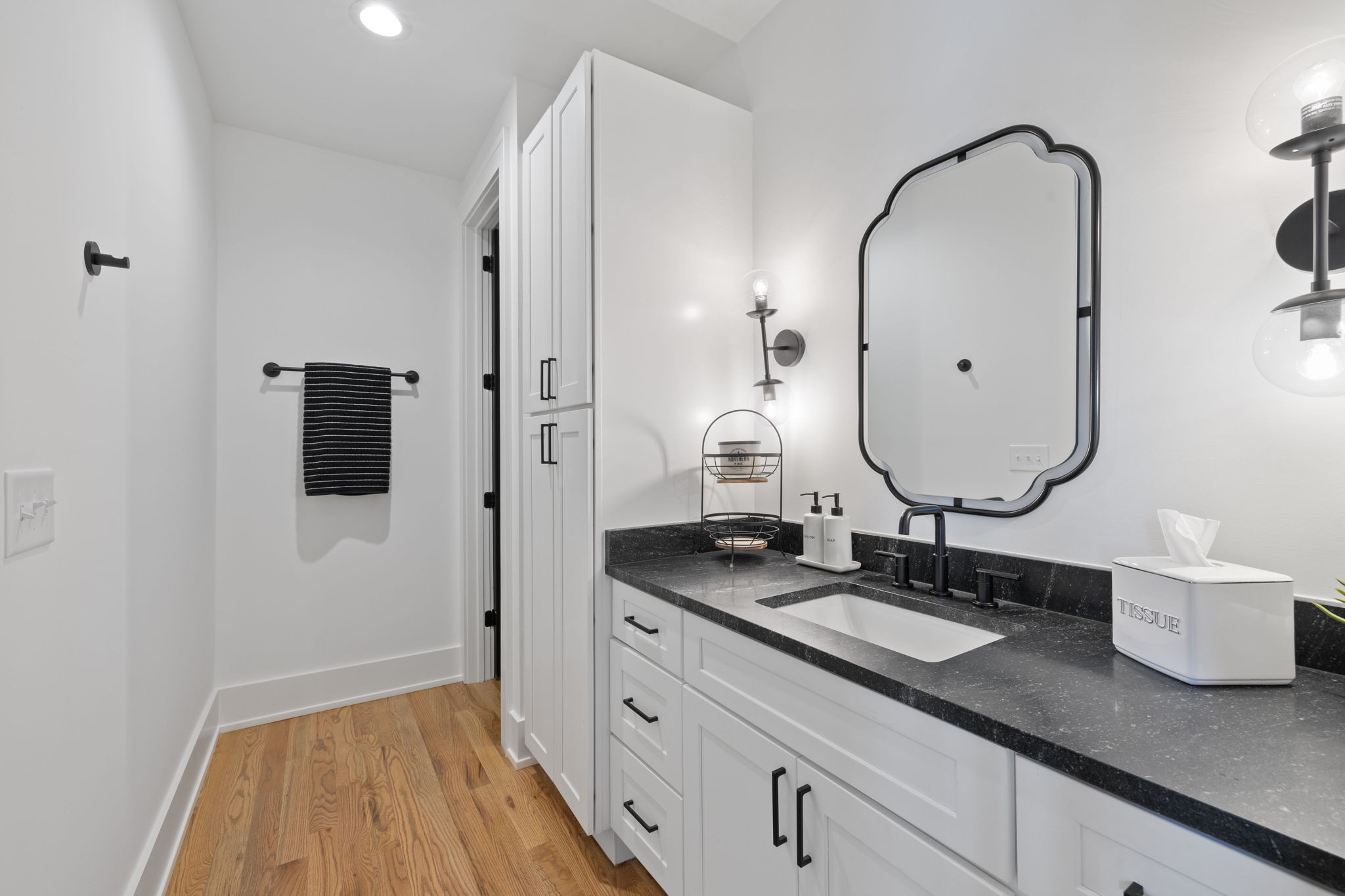 2904 Snowden Road Nashville, TN 37204 - Photo 53 of 69 a bathroom with a double vanity sink and mirror