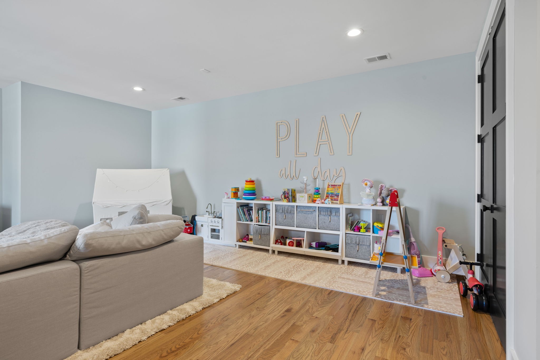 2904 Snowden Road Nashville, TN 37204 - Photo 54 of 69 a living room with furniture and a wooden floor