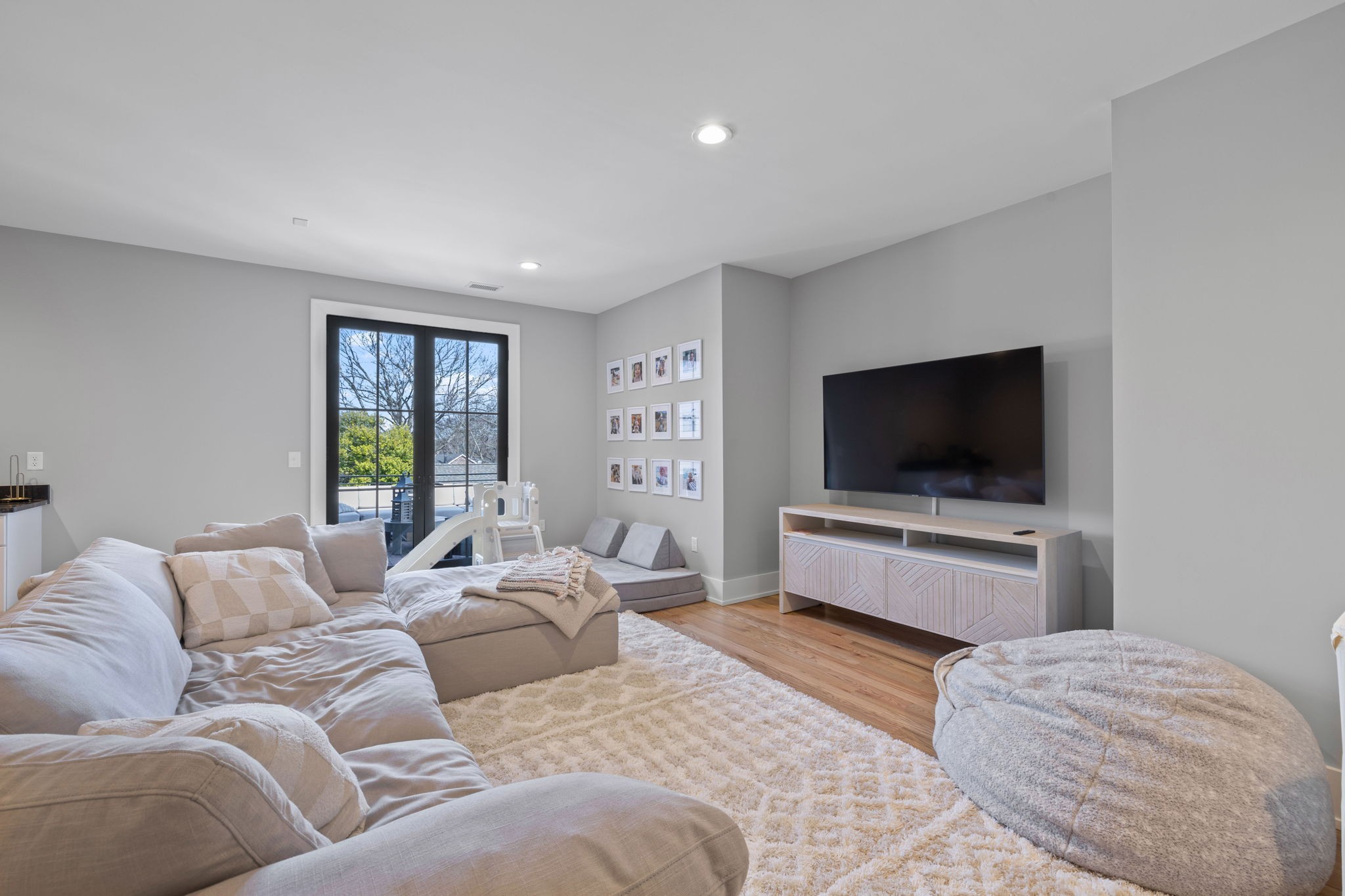 2904 Snowden Road Nashville, TN 37204 - Photo 55 of 69 a living room with furniture and a flat screen tv