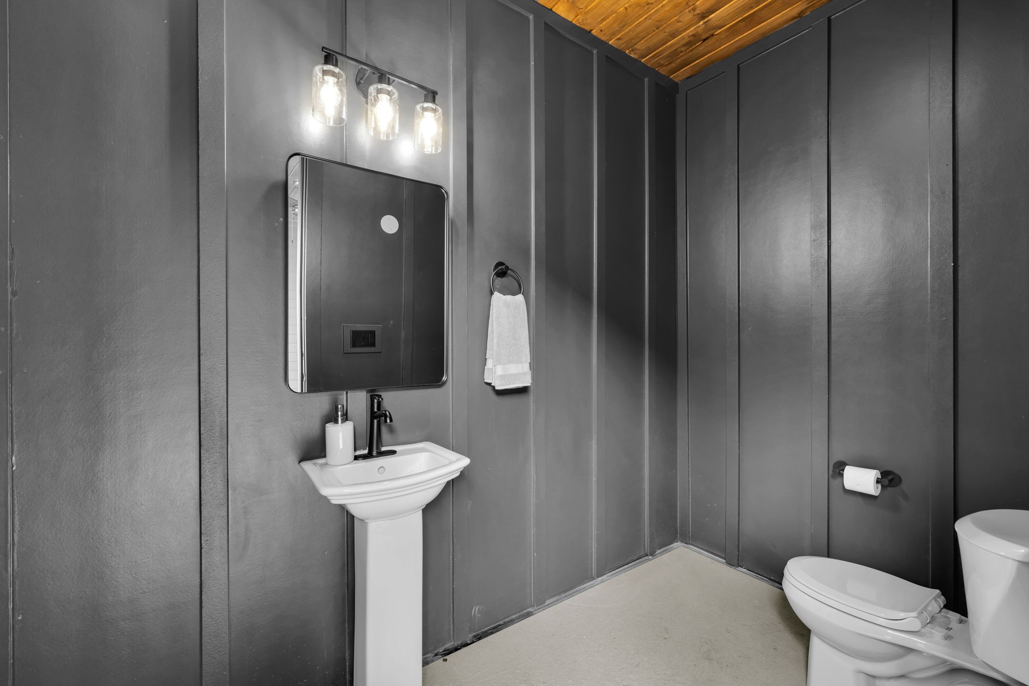 2904 Snowden Road Nashville, TN 37204 - Photo 60 of 69 a bathroom with a sink a toilet and mirror