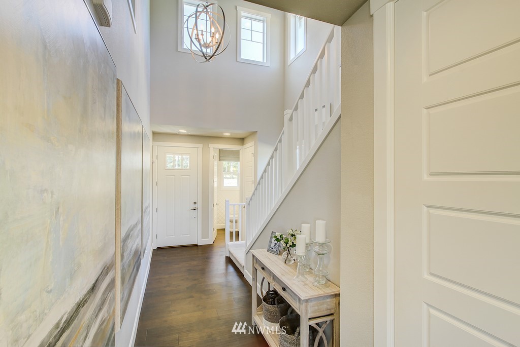 9779 Prospect Place Gig Harbor, WA 98332 - Photo 2 of 22 a view of an entryway with wooden floor