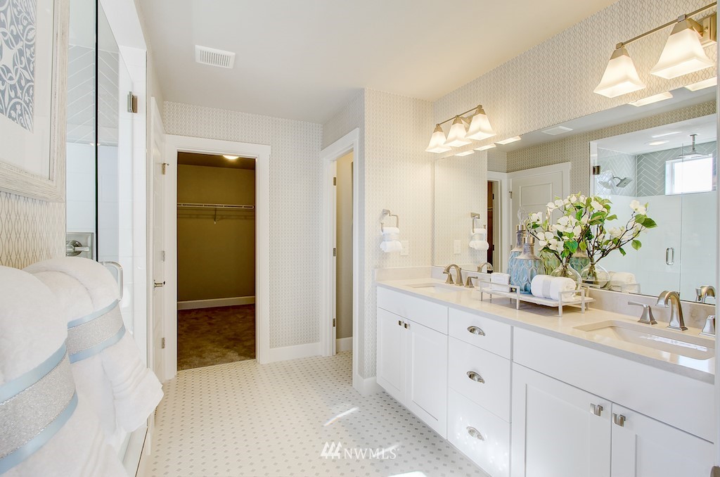 9779 Prospect Place Gig Harbor, WA 98332 - Photo 12 of 22 a bathroom with a sink and a mirror