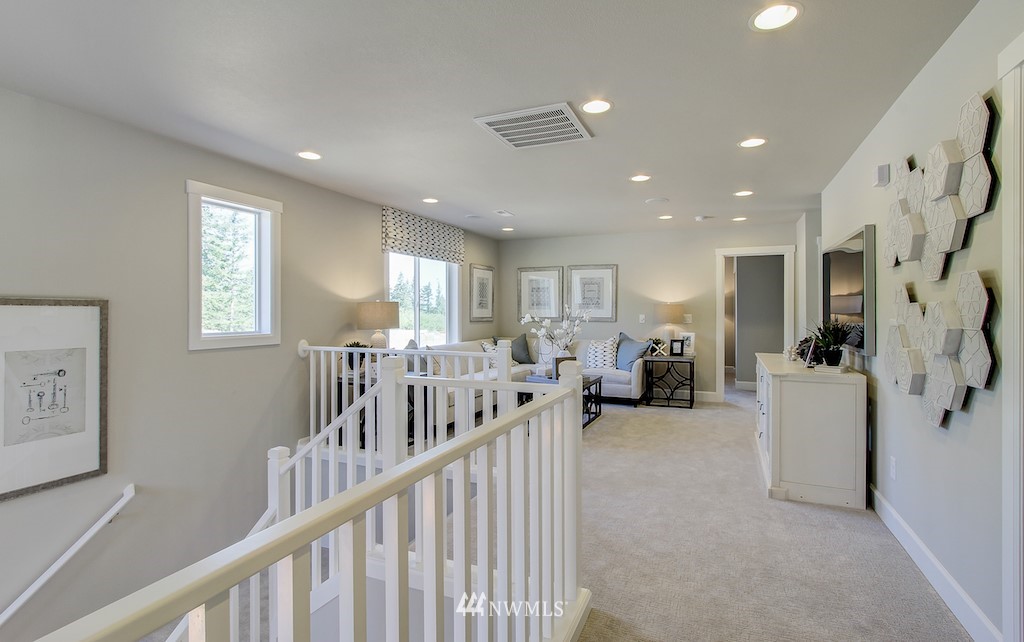 9779 Prospect Place Gig Harbor, WA 98332 - Photo 18 of 22 a view of hallway with livingroom and furniture
