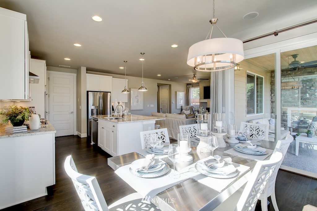 9779 Prospect Place Gig Harbor, WA 98332 - Photo 8 of 22 a view of a dining room and livingroom view