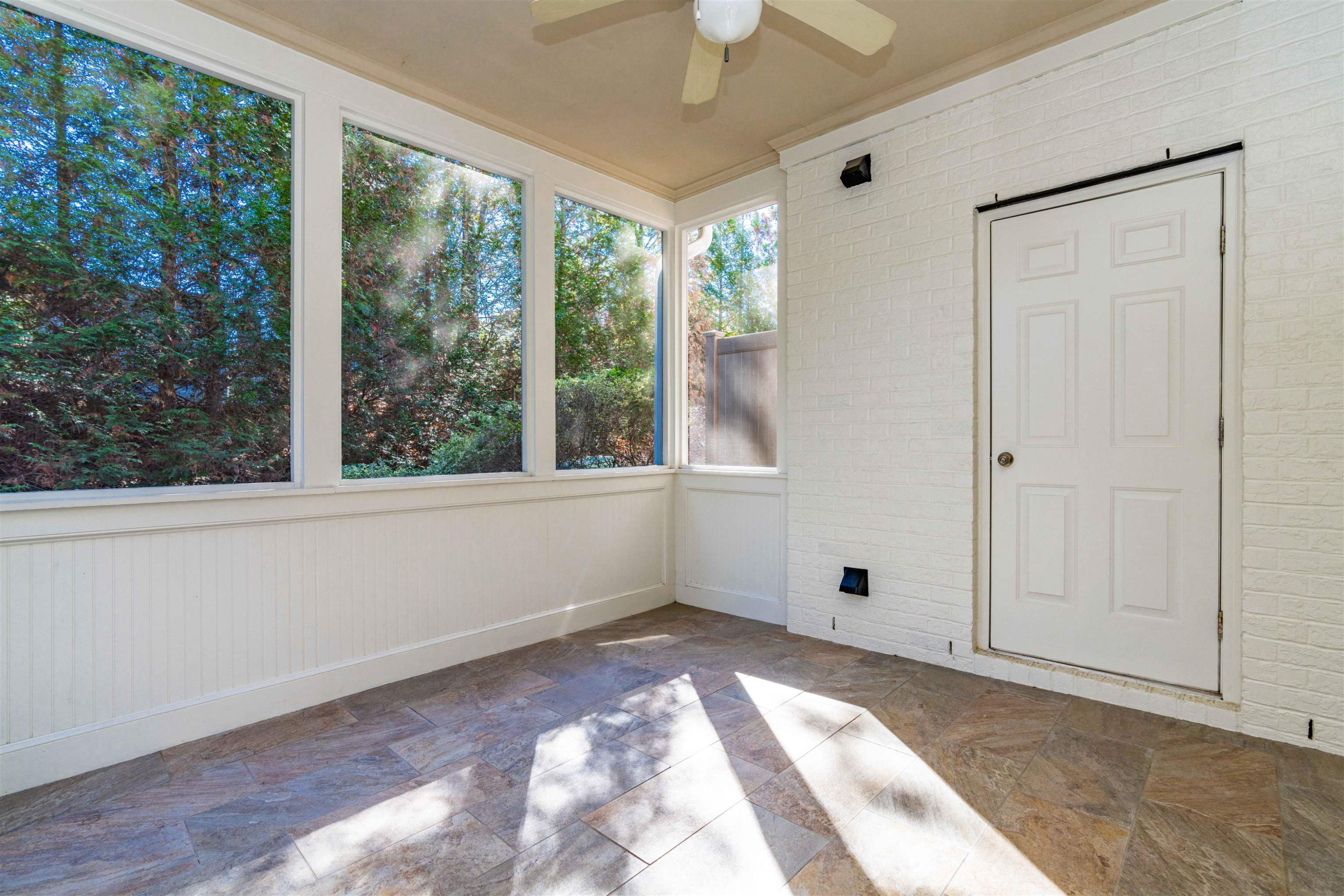 2081 Weston Green Loop Cary, NC 27513 - Photo 25 of 29 a view of empty room with window and hardwood floor