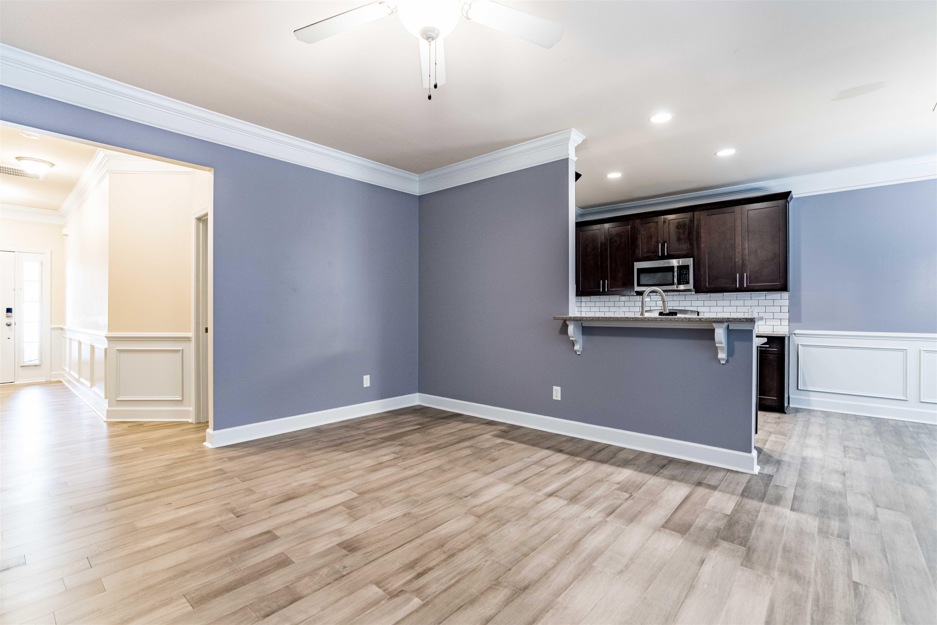 2081 Weston Green Loop Cary, NC 27513 - Photo 6 of 29 a view of kitchen with wooden floor and electronic appliances