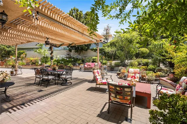 a view of a house with patio outdoor seating area