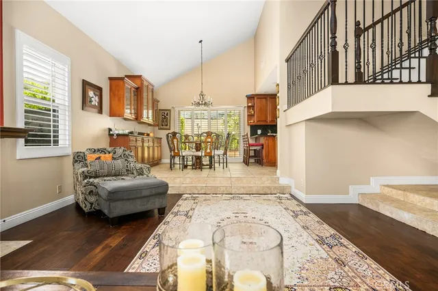 a living room with furniture and a table
