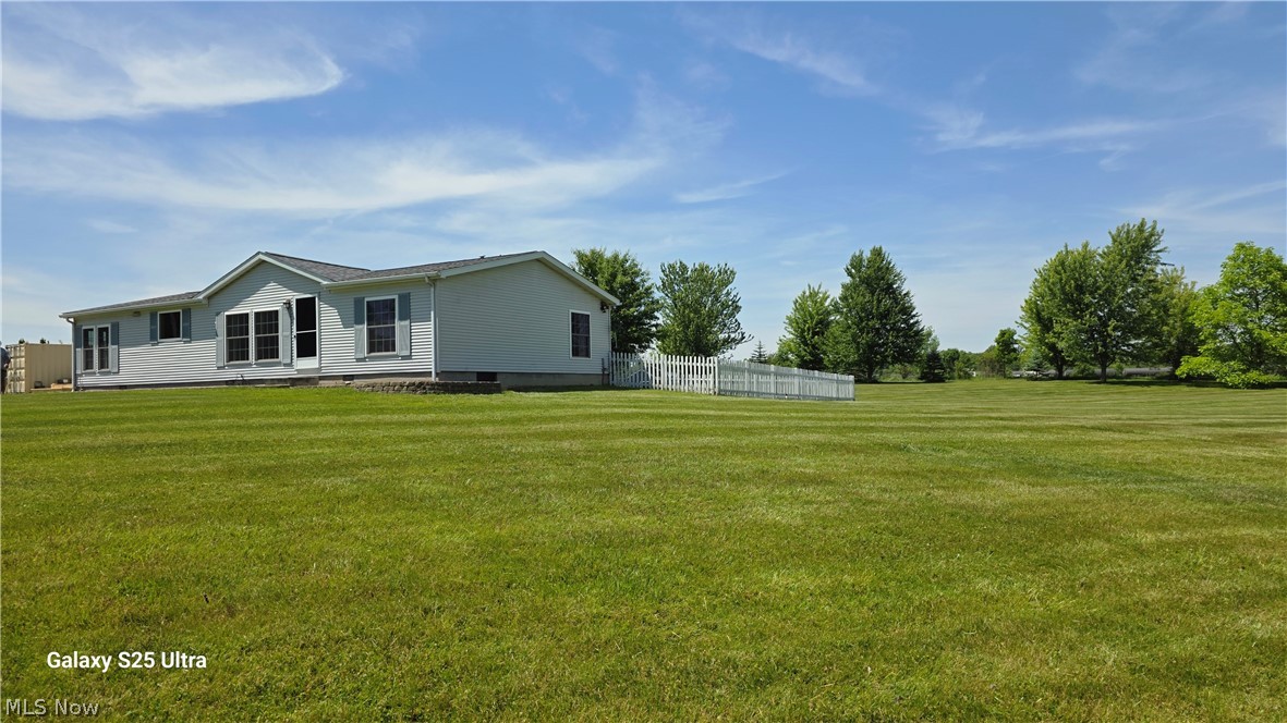 294 Twp 150 Road Sullivan, OH 44880 - Photo 38 of 39 Side view of this property with trees.