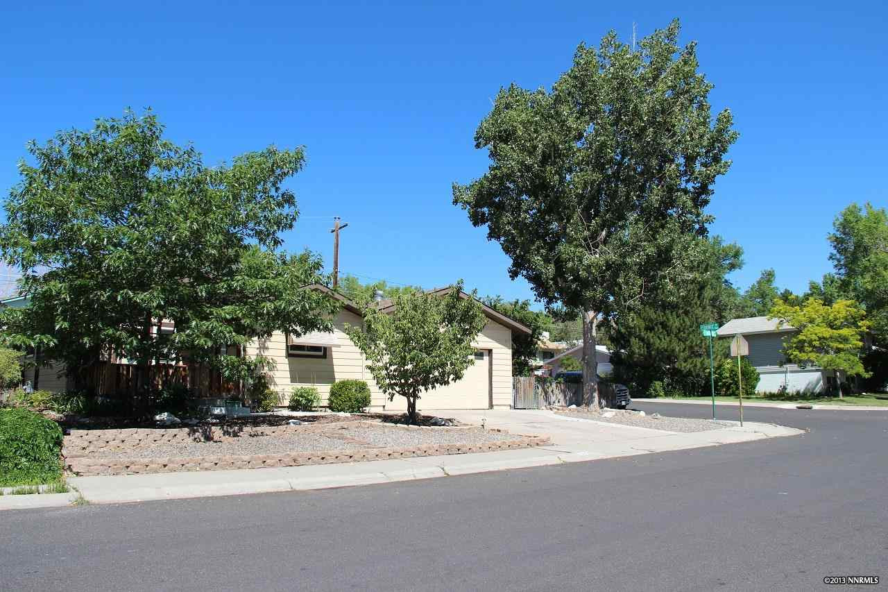 1365 Bridgewood Lane Reno, NV 89503 - Photo 1 of 1 a view of a house with a tree in front of it