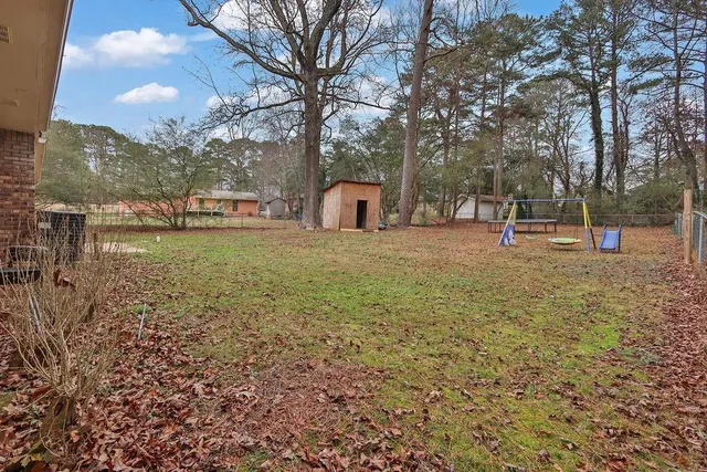 a fire hydrant in the middle of a field
