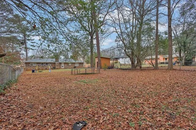 a view of house with outdoor space