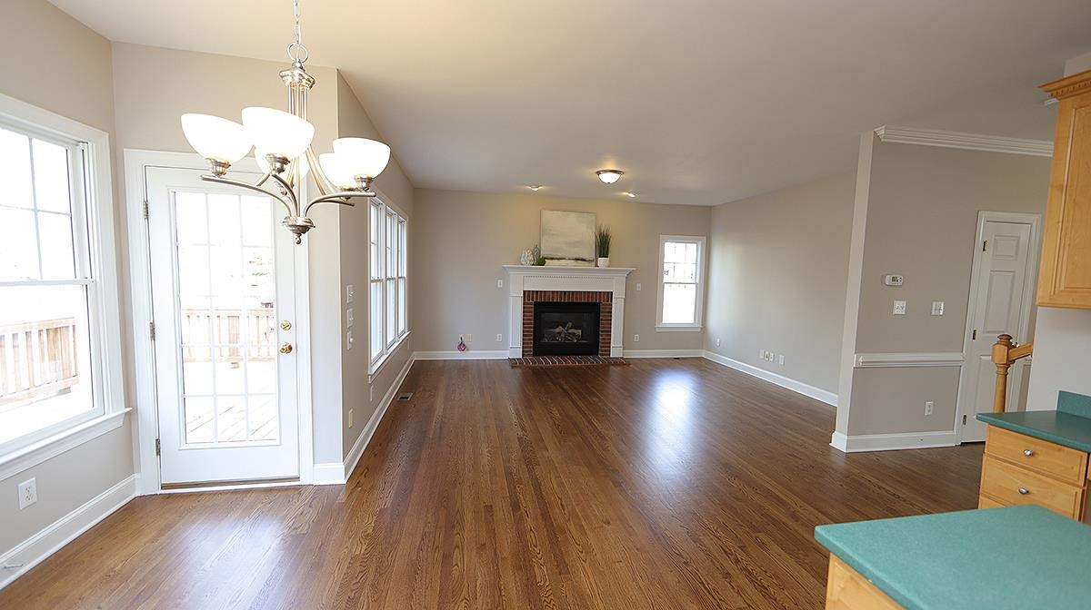 10401 Hallingdale Court Raleigh, NC 27614 - Photo 6 of 37 Breakfast Area has a door that leads out to Large Back Deck over looking Wooded Back Yard! Lots of Natural Light