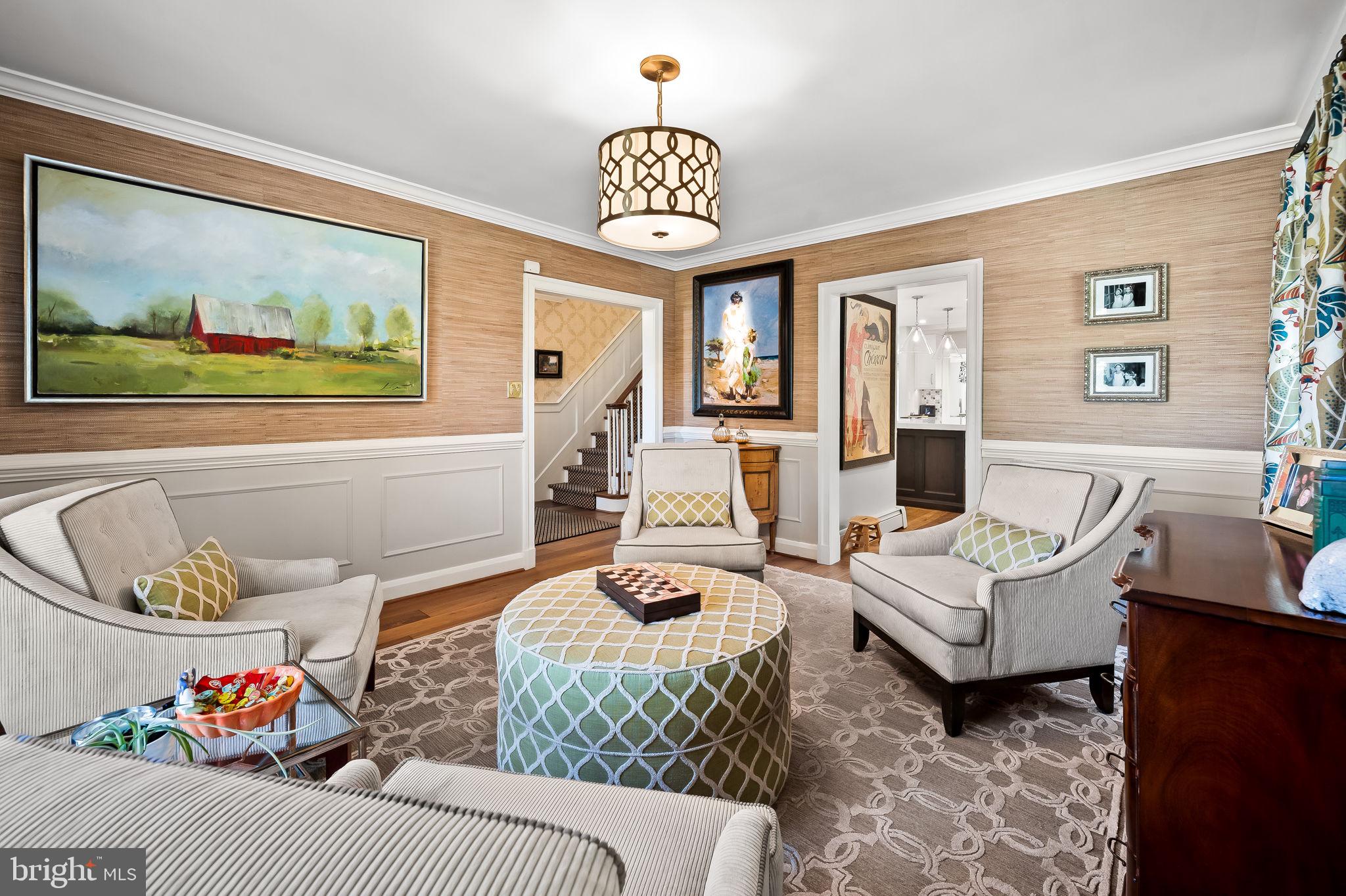 1719 Thornton Ridge Road Baltimore, MD 21204 - Photo 11 of 36 a living room with furniture and a chandelier