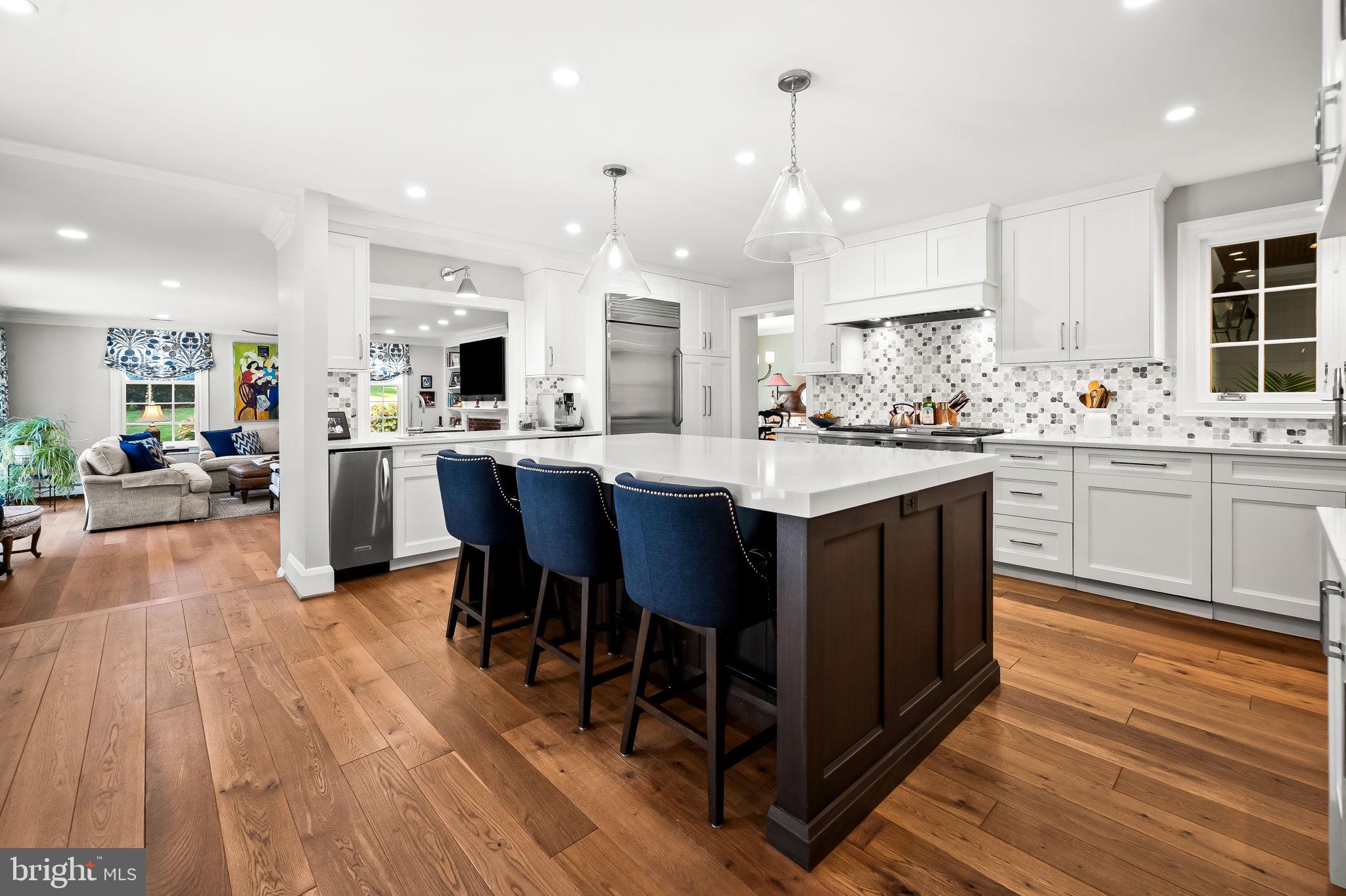 1719 Thornton Ridge Road Baltimore, MD 21204 - Photo 12 of 36 a kitchen with lots of counter top space and furniture
