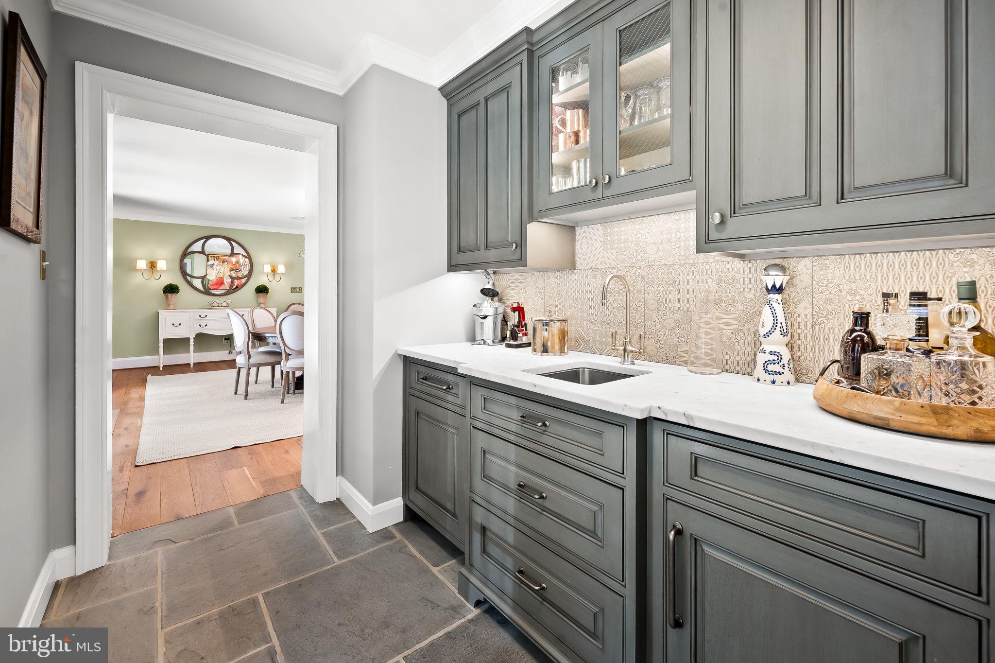 1719 Thornton Ridge Road Baltimore, MD 21204 - Photo 18 of 36 a kitchen with stainless steel appliances granite countertop a sink and cabinets