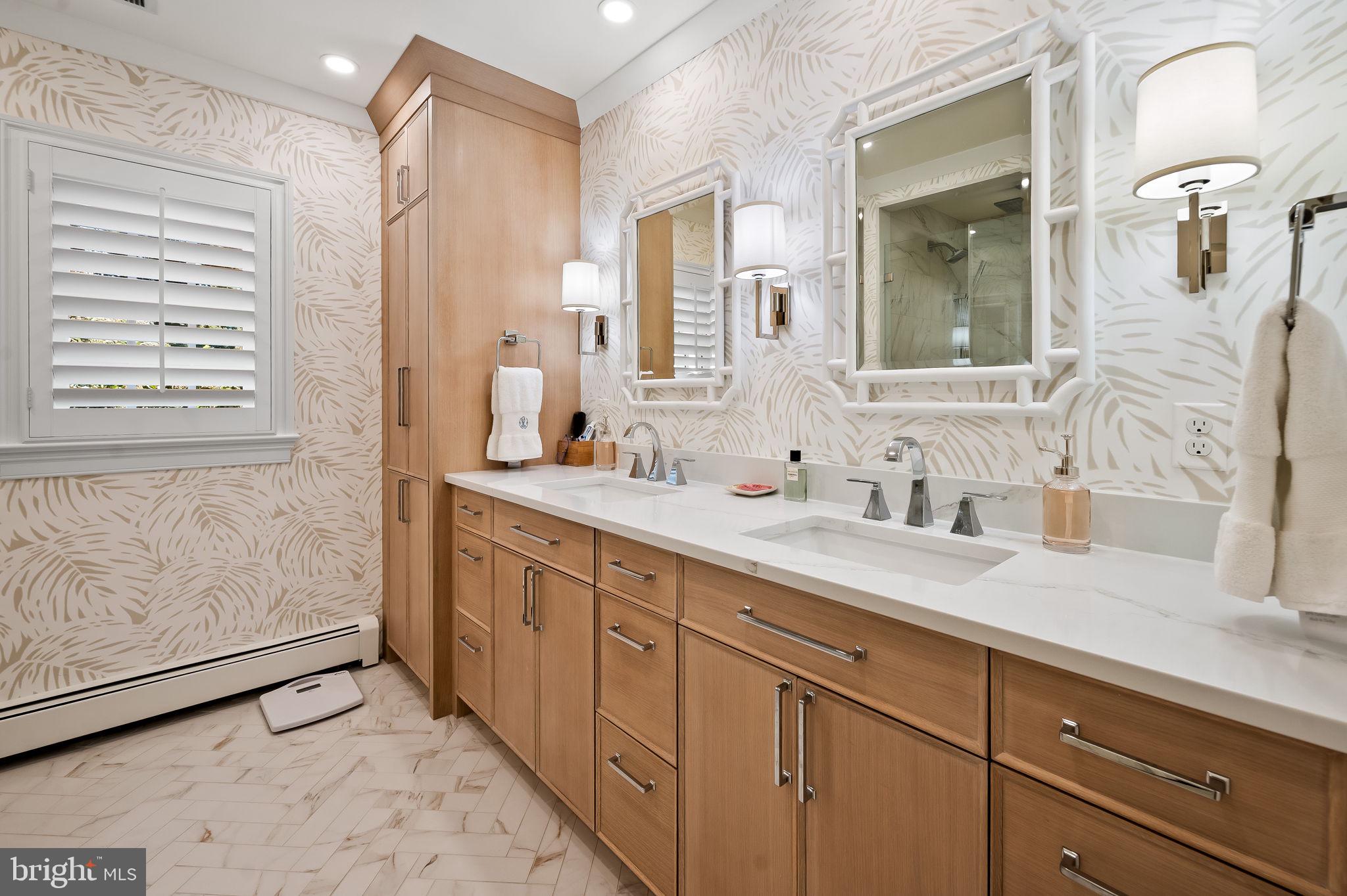 1719 Thornton Ridge Road Baltimore, MD 21204 - Photo 28 of 36 a spacious bathroom with a double vanity sink mirror and