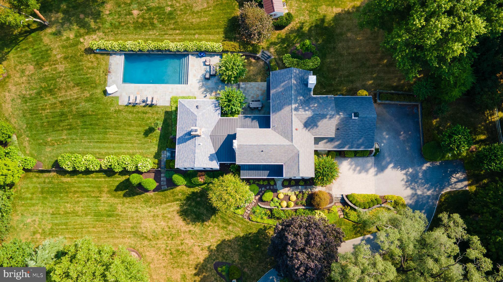 1719 Thornton Ridge Road Baltimore, MD 21204 - Photo 6 of 36 an aerial view of a house with a garden
