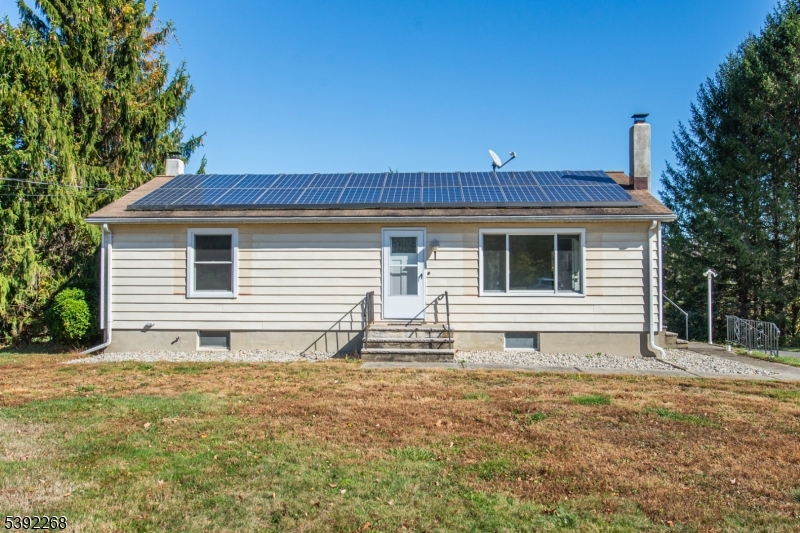 23 George Hill Road Augusta, NJ 07822 - Photo 16 of 19 a house with trees in the background
