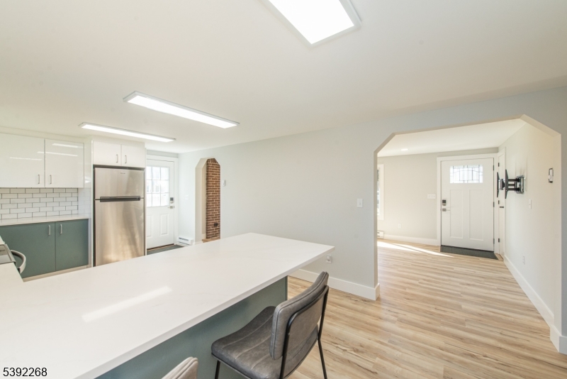 23 George Hill Road Augusta, NJ 07822 - Photo 6 of 19 a kitchen with a table and chairs