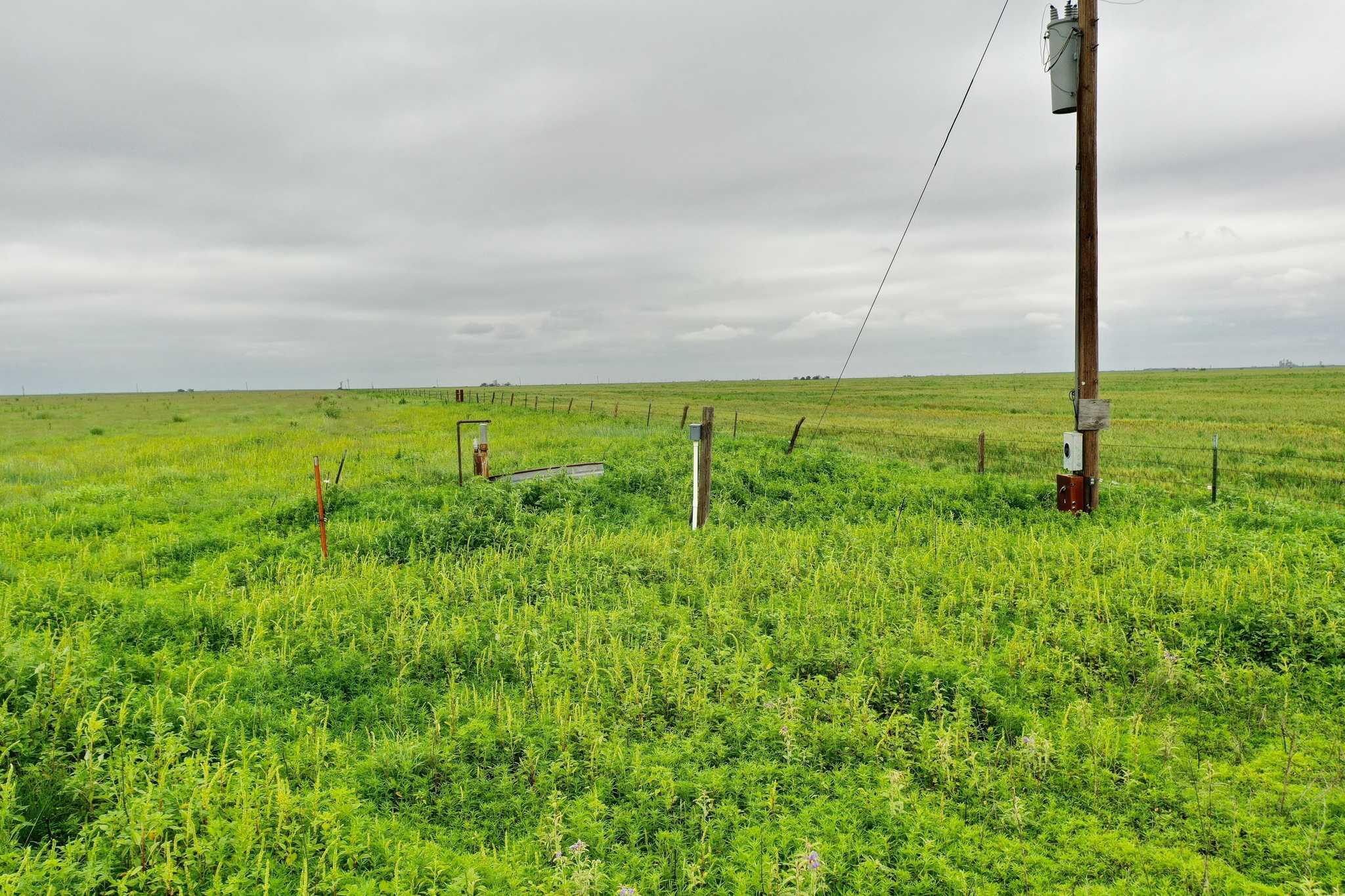 2015 County Road 9 Tulia, TX 79088 - Photo 14 of 33 a view of an outdoor space with a lake view