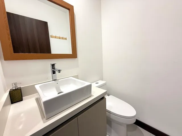 a view of a table and chairs in a room