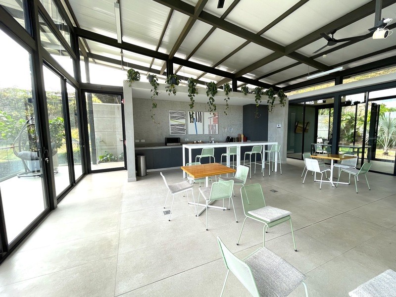 44 Condominio Bosques Del Cafe Mountains, Unit 44 Almont, CO 81210 - Photo 16 of 19 a view of a patio with a table and chairs
