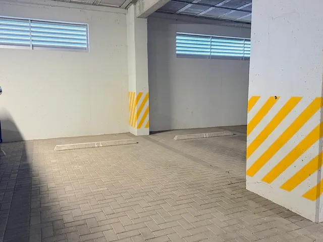 a view of a building with a garden