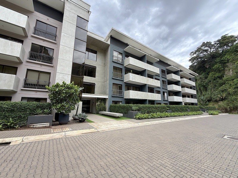44 Condominio Bosques Del Cafe Mountains, Unit 44 Almont, CO 81210 - Photo 18 of 19 a view of a building with a garden